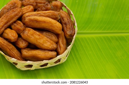 Sun-dried Bananas In Bamboo Basket On Bannana Leaf