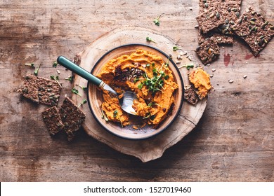 Sundried Tomatoes Hummus With Bread Pinion And Greminated Seeds