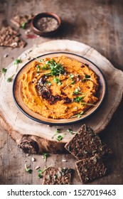 Sundried Tomatoes Hummus With Bread Pinion And Greminated Seeds