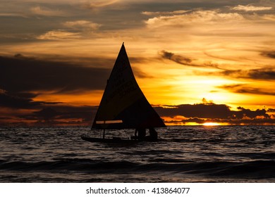 Sunfish Sailing At Sunset