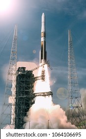 Sunflare and rocket. The elements of this image furnished by NASA.