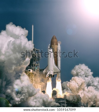 Sunflare and rocket. The elements of this image furnished by NASA.