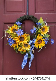 Sunflower door wreath on red door