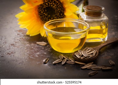 Sunflower oil in bottle glass with seed