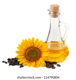 Sunflower Oil With Flower And Seeds. On A White Background