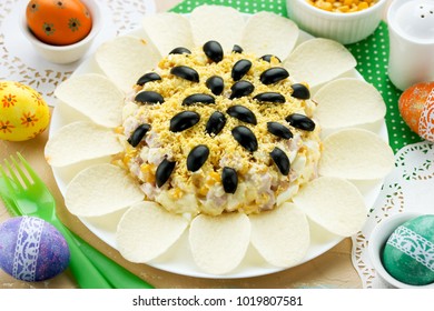 Sunflower Salad Decorated With Potato Chips, Corn, Egg And Olive For Festive Easter Dinner