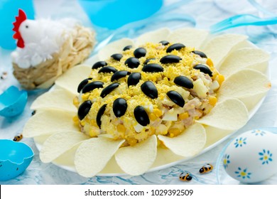 Sunflower Salad Decorated With Potato Chips, Corn, Egg And Olive For Festive Easter Dinner