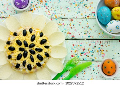 Sunflower Salad Decorated With Potato Chips, Corn, Egg And Olive For Festive Easter Dinner