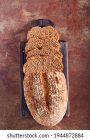 Sunflower Seed Bread, Sliced On Board