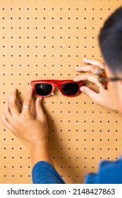 Sunglass On A DIY Peg Board.