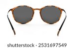 Sunglasses back view isolated on white background. Leopard color eyeglasses round frame with black uv lens against sunlight on vacation. Glasses circle shape rear view vintage and retro style for