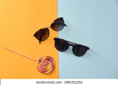 sunglasses eyewear on pastel color paper background 