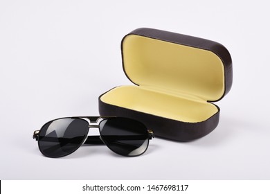 Sunglasses with glasses case isolated on white