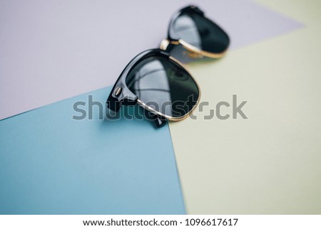sunglasses on a colored background