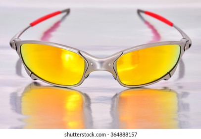 Sunglasses on the silver background