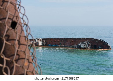 Sunken Abandoned Ship In Water. Ship Wreck, Storm, Tragedy. Ship. Shipwreck. Sea. Abandoned. Boat. Vessel. Broken. Old. Sunken. Water. Disaster. Transportation. Wreck