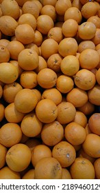 A Sunkist Orange On The Grocery Display 