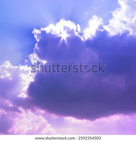 Sunlight beams through a dramatic purple cloud formation against a bright blue sky.