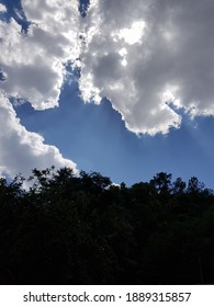 Sunlight Beautifully Raying Out The White Clouds On A Sunny Summer Day Creating A Stunning Visual Effect In Mingora Swat Pakistan.