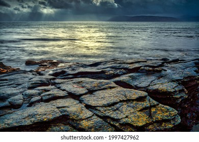 Sunlight between stormy clouds on the Mull of Kintyre.