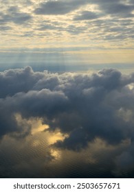 Sunlight Breaking Through Clouds Over the Black Sea. High quality photo