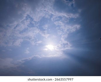 Sunlight Breaking Through Dramatic Cloudy Sky Radiant Morning Scene