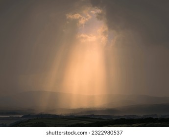 sunlight breaking through the stormy clouds