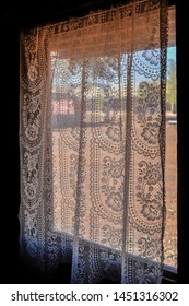 Sunlight Coming Through An Old Window With A Tattered Lace Curtain, Old Prospectors House, Leonora, Circa 1920.
Sons Of Gwalia Gold Mine Western Australia.