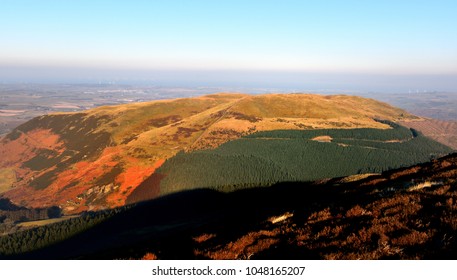 Sunlight On Graystones And Kirk Fell