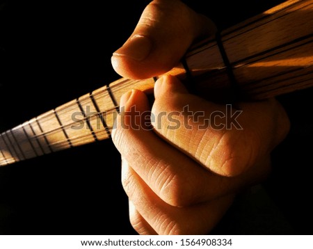 Similar – Broken guitar broken