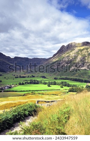 Sunlight on the Langdale Pikes and Valley