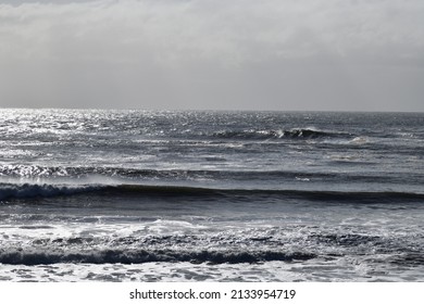 Sunlight On Large Surf Waves