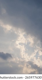 Sunlight Rays Piercing Through White Clouds - Atmospheric Sky