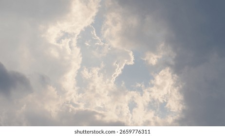 Sunlight Rays Piercing Through White Clouds - Atmospheric Sky