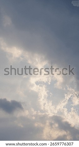 Sunlight Rays Piercing Through White Clouds - Atmospheric Sky