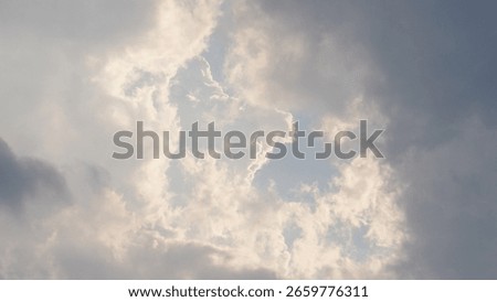Sunlight Rays Piercing Through White Clouds - Atmospheric Sky