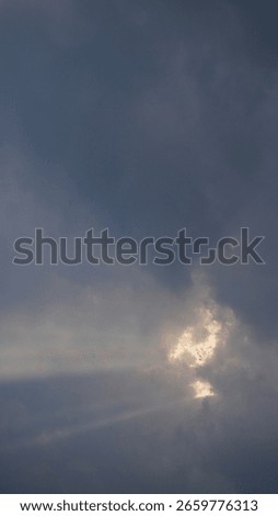 Sunlight Rays Piercing Through White Clouds - Atmospheric Sky