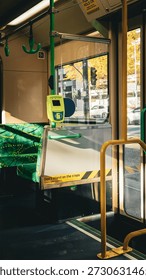 Sunlight reflections on the interior of an old Melbourne tram. The yellow and green interior of a Melbourne tram