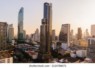 sunlight rooftop view skyline bangkok twilight, office buildings, living, condominium in bangkok city  skyline top view Downtown and business office bank financial in capital city of thailand asian