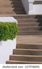 Sunlight And Shadow On Surface Of Exposed Aggregate Finish Cobble Stone Staircase Decoration In Vertical Frame 