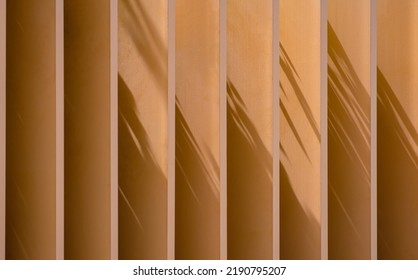 Sunlight and shadow on surface of vertical Wooden Shading Fins outside of Vintage House - Shutterstock ID 2190795207