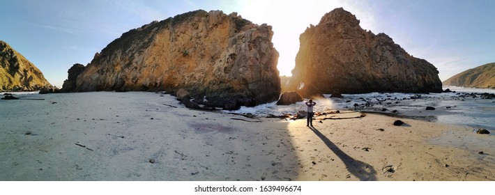 Sunlight Shining Between The Rocks At Pfeiffer Beach, CA