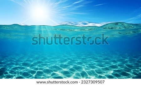 Sunlight shining ,the surface and under the blue ocean, sea wave , with clean waters in summer time