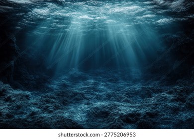 Sunlight streams through the ocean's surface, illuminating the underwater world. The light creates a mesmerizing display of light and shadow, highlighting the depths below.