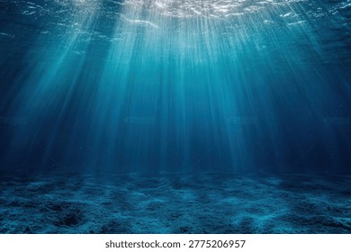 Sunlight streams through the ocean's surface, illuminating the underwater world. The light creates a beautiful and peaceful scene, highlighting the seabed below.