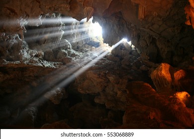 Sunlight through a cave hole.