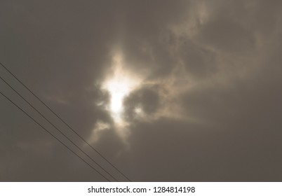 sunlight through the dark clouds