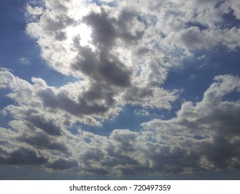 Sunlight through white clouds