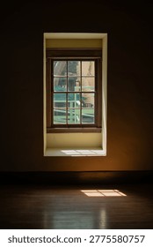 Sunlight through window casting shadow on wooden floor, minimalist interior background