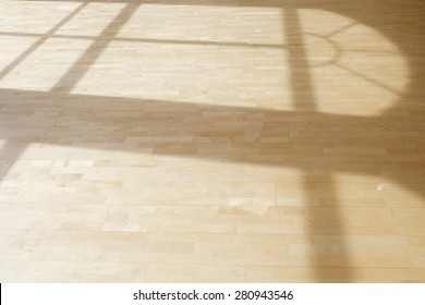 Sunlight From Window Falling On Wooden Floor In Dance Hall Loft Interior